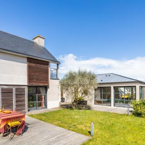 photo 1: Maison d’architecte avec piscine intérieure et jardin à Saint-Vincent 7 pièce(s)